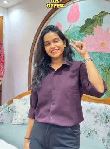 Inside Shree Shubh Labh, with a painted lotus mural